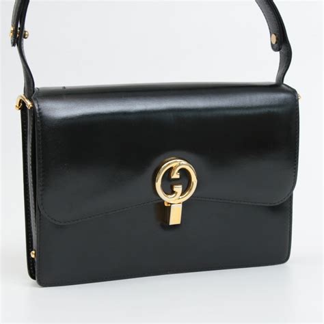 gucci plain black leather handbag vintage|value of vintage Gucci handbags.